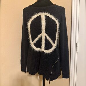 “LA REYNA” Navy blue sweater featuring a peace symbol
